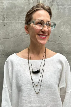 Shape Shifter Necklace - Brass and Black Tibetan Glass